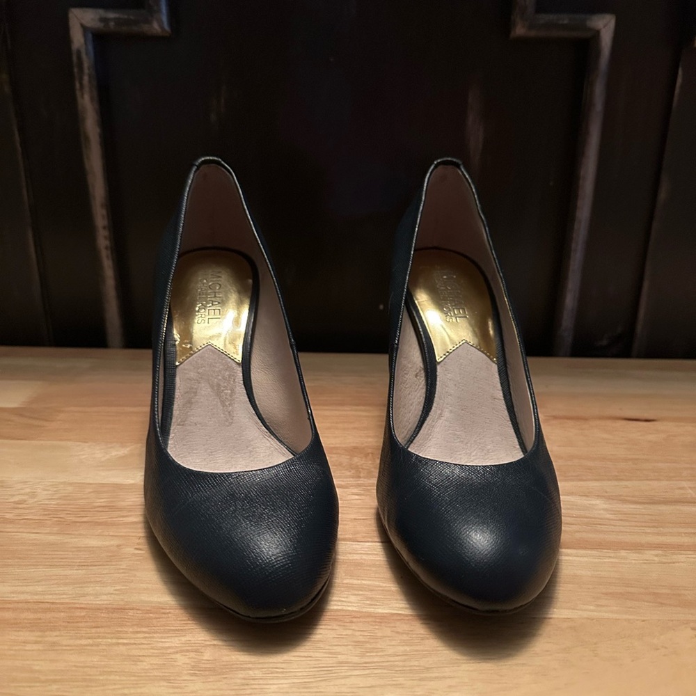 Michael Lors Navy leather heels. Size 7. Never worn.